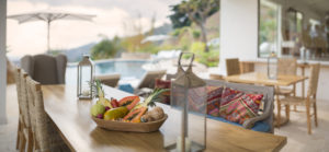 the-retreat-costa-rica-dining-table-with-orange-papaya